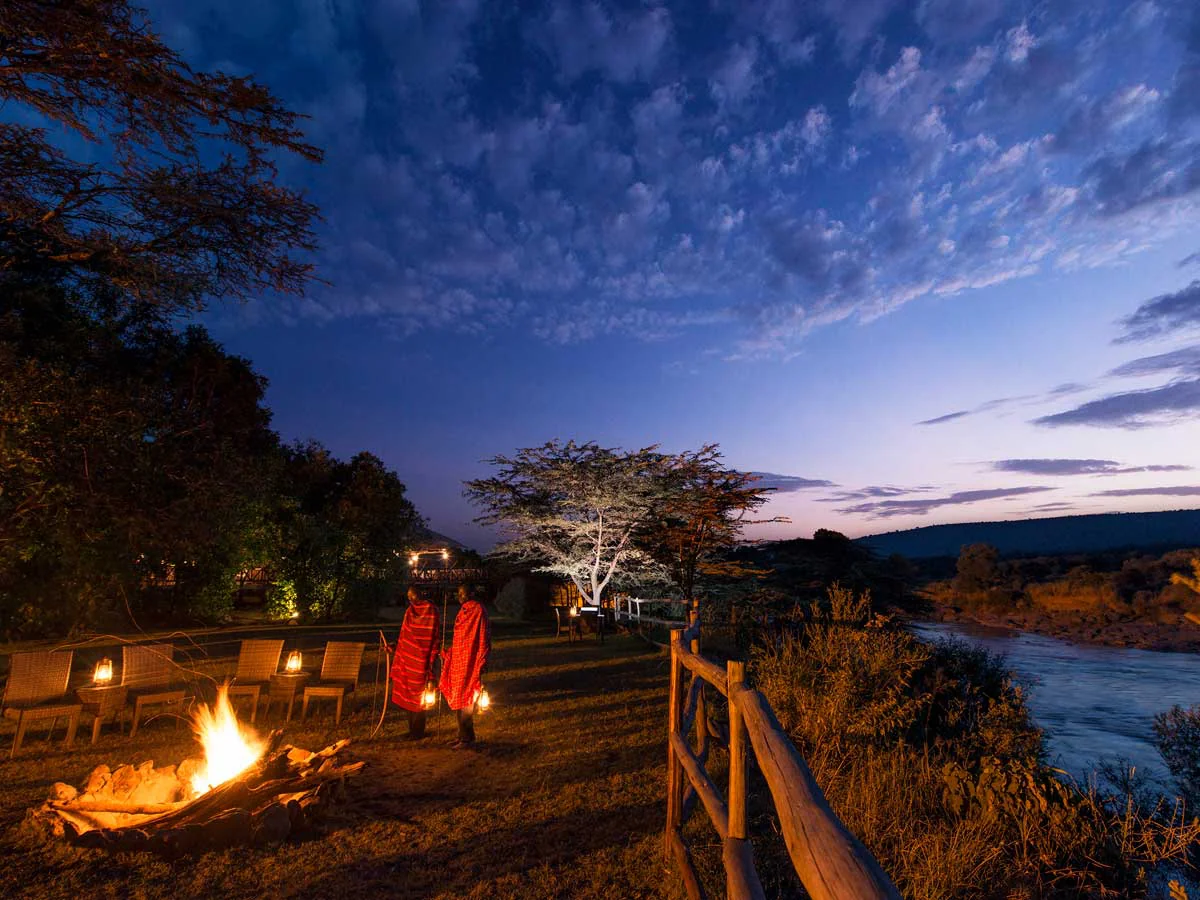 The Ultimate Guide to Safari of Africa and Packages 27 Maasai at Maasai Mara near river - African safari packages